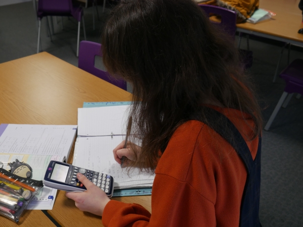 Students at Solihull Sixth Form College participate in a mathematics class