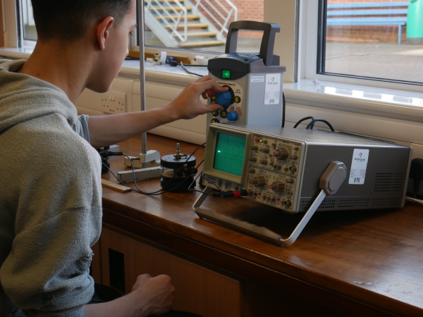 Students at Solihull Sixth Form College participate in a Physics experiment
