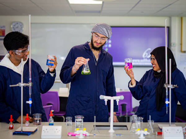 Students at Solihull Sixth Form College participate in a science experiment