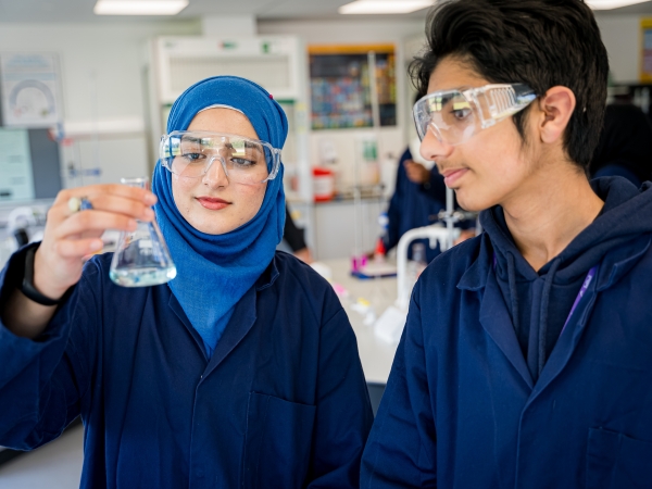 Students at Solihull Sixth Form College participate in a science experiment