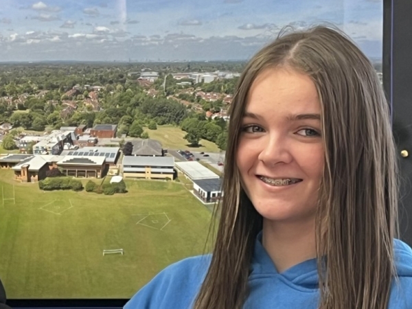 Solihull Sixth Form College student Kaitlyn Quinn gets award from Principal Martin Sullivan