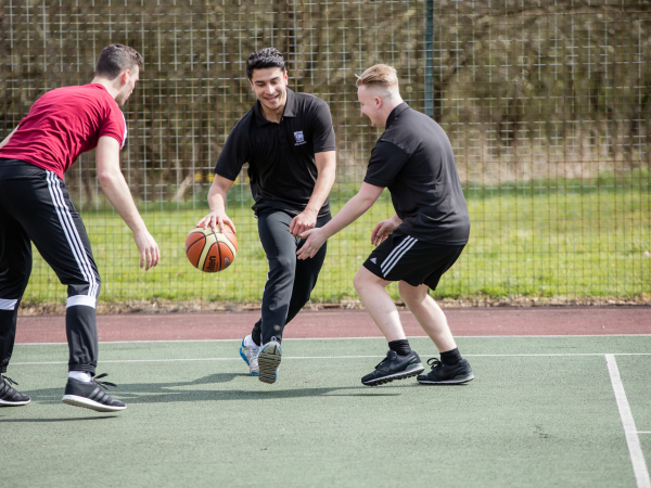 Students at Solihull Sixth Form College play basketball