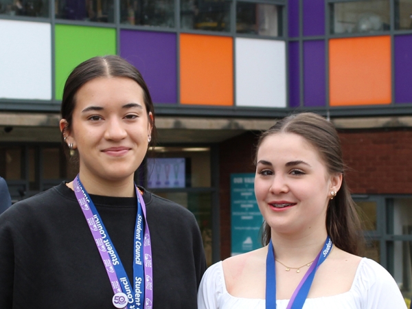 Principal Martin Sullivan and Summit Learning Trust CEO Vince Green with students at Solihull Sixth Form College
